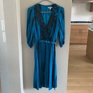 Eva Mendes by New York and Co blue with black print midi dress.